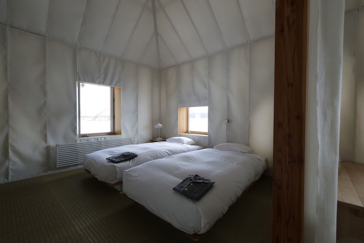 メムアースホテル ベッドルーム