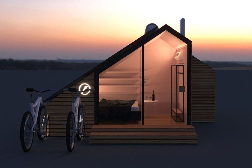 夕暮れの中たたずむ太陽光発電キャビン「e-glamp」