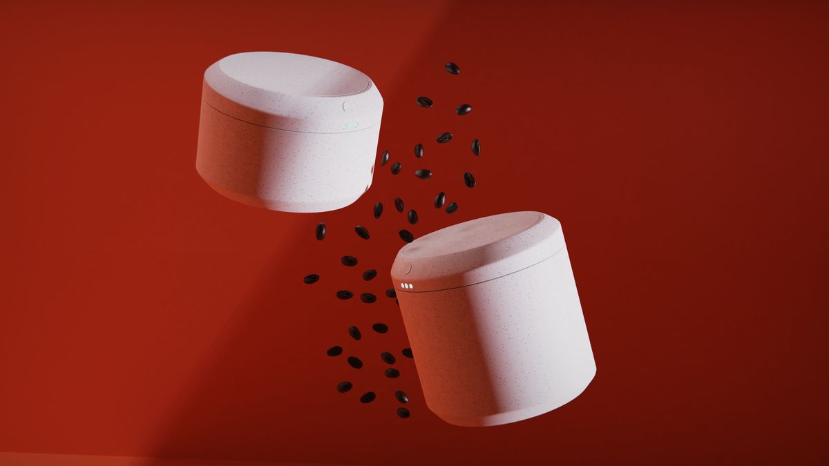 赤い背景に宙に浮くコーヒー豆と白色の「Jugi」２つ