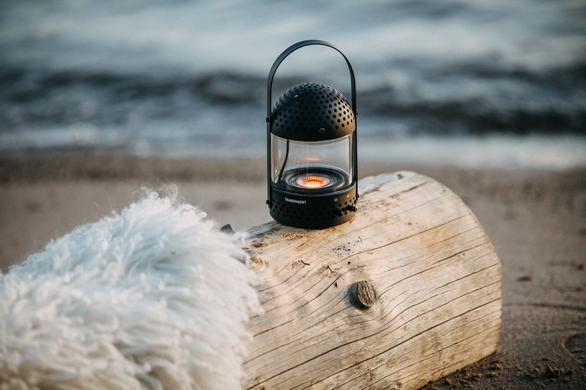 Light Speaker placed on a log
