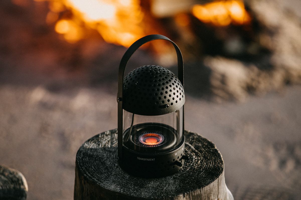 Portable speaker placed on a stump