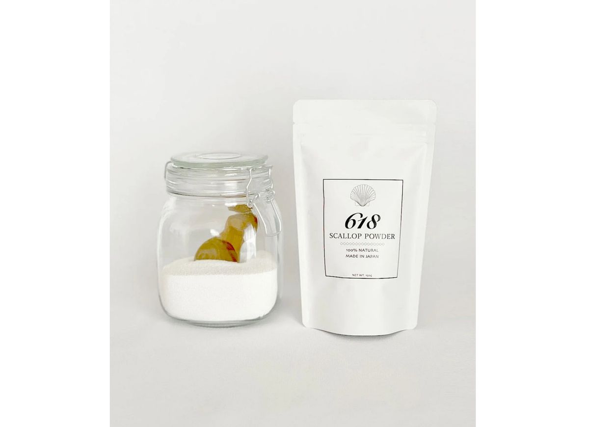 環境にやさしい食器用洗剤「ホタテパウダー」のパッケージと中身が入った瓶