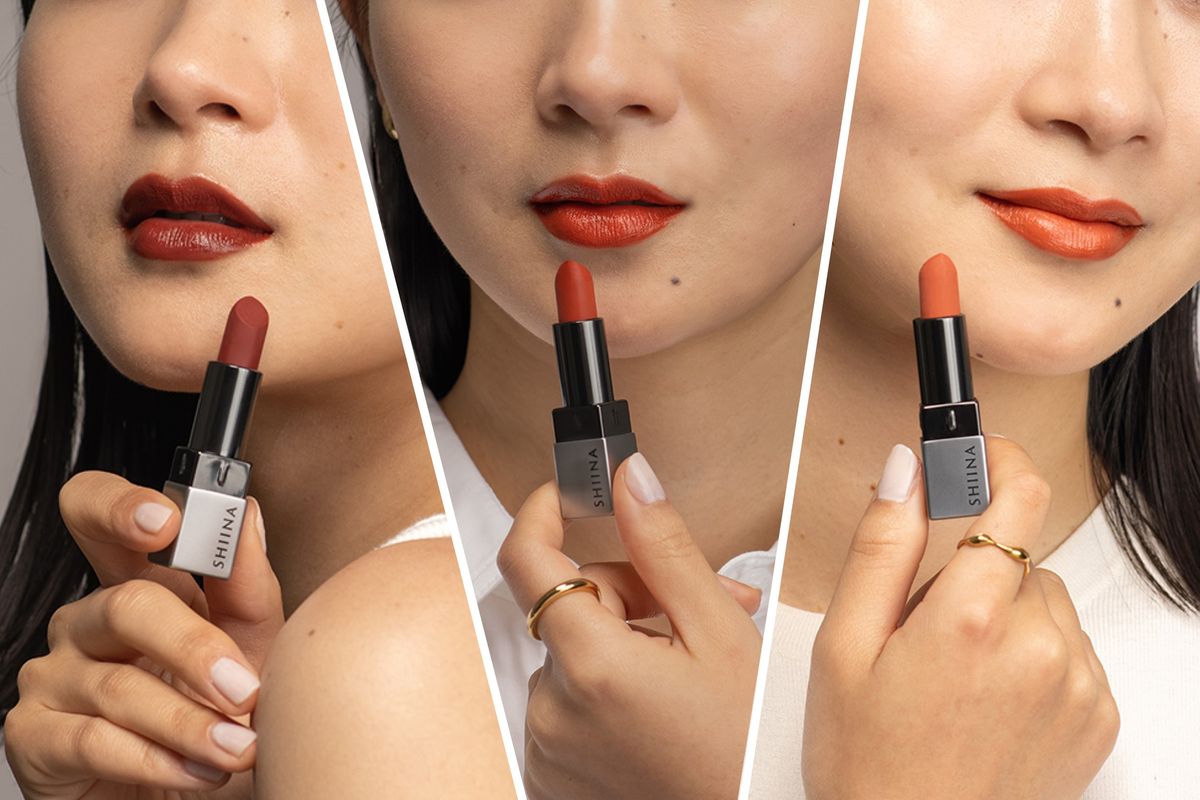 ３色の口紅を塗った女性